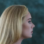 A photo of Adele, a Singer, who has a Soft Autumn color profile.