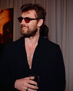 A photo of Alex Pettyfer, a Actor, who has a Soft Autumn color profile.