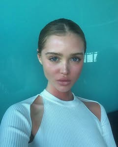 A photo of Aliyah Galyautdinova, a Model, who has a Soft Autumn color profile.