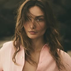 A photo of Andreea Diaconu, a Model, who has a Soft Autumn color profile.