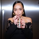 A photo of Ashley Madekwe, a Actress, who has a Soft Autumn color profile.