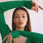 A photo of Audreyana Michelle, a Model, who has a Soft Autumn color profile.
