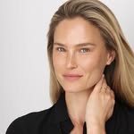 A photo of Bar Refaeli, a Model, who has a Soft Autumn color profile.