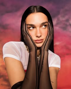 A photo of Dua Lipa, a Singer, who has a Bright Winter color profile.