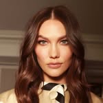 A photo of Karlie Kloss, a Supermodel, who has a Soft Autumn color profile.