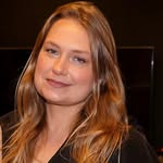 A photo of Merritt Wever, a Actress, who has a Soft Autumn color profile.