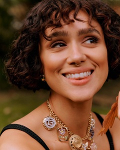 A photo of Nathalie Emmanuel, a Actress, who has a Soft Autumn color profile.