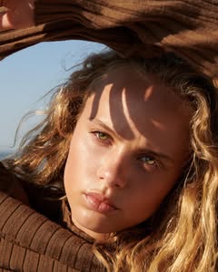 A photo of Olivia Vinten, a Model, who has a Soft Autumn color profile.