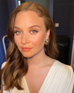 A photo of Sonja Gerhardt, a Actress, who has a Light Spring color profile.