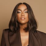 A photo of Tyra Banks, a Supermodel, TV Personality, who has a Soft Autumn color profile.
