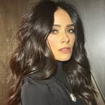 A photo of Abigail Spencer, a Actress, who has a Dark Winter color profile.