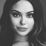 A photo of Afshan Azad, a Actress, who has a Dark Winter color profile.