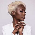 A photo of Angelica Ross, a Actress, who has a Dark Winter color profile.