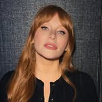 A photo of Bryce Dallas Howard, a Actress, who has a Light Spring color profile.
