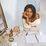 A photo of Chanel Iman, a Model, who has a Dark Autumn color profile.