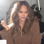 A photo of Chrissy Teigen, a Model, who has a Dark Autumn color profile.