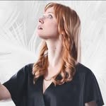 A photo of Deborah Ann Woll, a Actress, who has a Light Spring color profile.