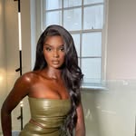A photo of Duckie Thot, a Model, who has a Dark Autumn color profile.