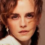 A photo of Emma Watson, a Actress, who has a Dark Autumn color profile.