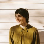 A photo of Finn Wolfhard, a Singer, who has a Dark Winter color profile.