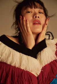 A photo of Lu Huang, a Actress, who has a Bright Spring color profile.