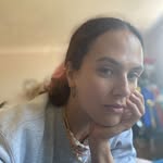 A photo of Jessica Brown Findlay, a Actress, who has a Soft Summer color profile.