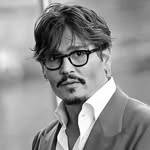 A photo of Johnny Depp, a Actor, who has a Dark Winter color profile.