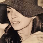 A photo of Julianna Margulies, a Actress, Producer, who has a Dark Winter color profile.