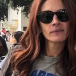 A photo of Julia Roberts, a Actress, who has a Dark Autumn color profile.
