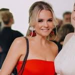 A photo of Katie Holmes, a Actress, who has a Soft Summer color profile.