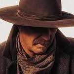 A photo of Kevin Costner, a Actor, Director, who has a Soft Summer color profile.