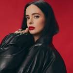 A photo of Krysten Ritter, a Actress, Author, who has a Bright Winter color profile.