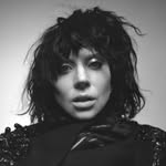A photo of Lady Gaga, a Singer, Actress, who has a Dark Autumn color profile.