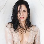 A photo of Lana Parrilla, a Actress, who has a Dark Winter color profile.