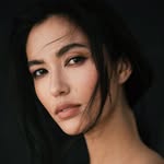 A photo of Li Ann Smal, a Model, Marine Scientist, who has a Dark Autumn color profile.