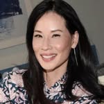 A photo of Lucy Liu, a Actress, Artist, who has a Dark Winter color profile.