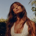 A photo of Maggie Q, a Actress, Activist, who has a Dark Autumn color profile.