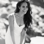 A photo of Meghan Markle, a Duchess, Actress, who has a Dark Autumn color profile.