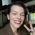 A photo of Milla Jovovich, a Actress, Model, Musician, who has a Bright Spring color profile.
