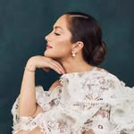 A photo of Minka Kelly, a Actress, who has a Dark Autumn color profile.