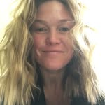 A photo of Julia Stiles, a Actress, who has a Dark Autumn color profile.