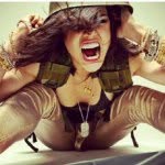 A photo of Michelle Rodriguez, a Actress, who has a Dark Winter color profile.