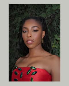 A photo of Jessica Williams, a Actress, Entrepreneur, who has a Dark Winter color profile.