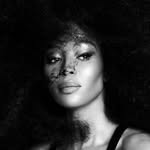 A photo of Naomi Campbell, a Supermodel, Activist, who has a Dark Winter color profile.