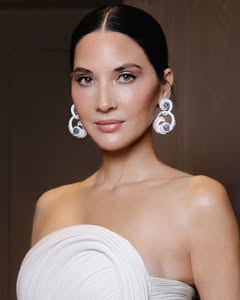 A photo of Olivia Munn, a Actress, TV Host, who has a Bright Winter color profile.
