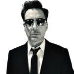 A photo of Robert Downey Jr., a Actor, who has a Dark Winter color profile.