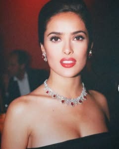 A photo of Salma Hayek, a Actress, Producer, who has a Dark Winter color profile.