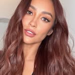 A photo of Shay Mitchell, a Actress, Entrepreneur, who has a Dark Winter color profile.