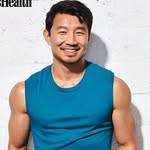 A photo of Simu Liu, a Actor, who has a Dark Winter color profile.