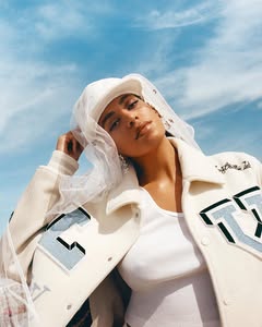 A photo of Solange, a Singer, Songwriter, who has a Bright Spring color profile.